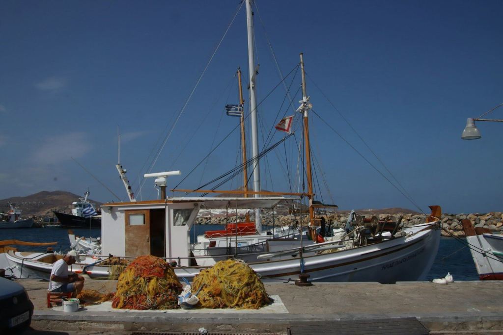 a boat docked at a pier